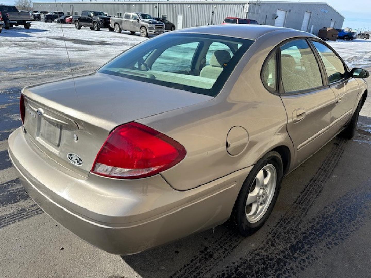 2004 Gold /Beige Ford Taurus (1FAFP55S74G) , Automatic transmission, located at 3200 1st Avenue North, Billings, MT, 59101, (406) 245-9055, 45.779270, -108.510742 - Low Mileage Local Trade-In. Well Maintained, Power Seat, Power Windows, Power Door Locks, Tilt Steering, Duratec Engine and Much More! CarFax Dealer. Auto Brokers of Montana/AA&A Auto Rental/Fox Car Rental Billings - Photo#5